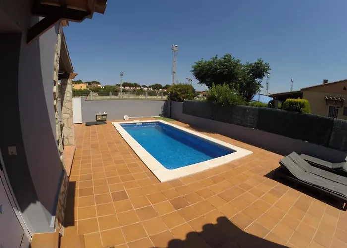 Дом отдыха Casa En L Escala Con Piscina Y Wifi Free *